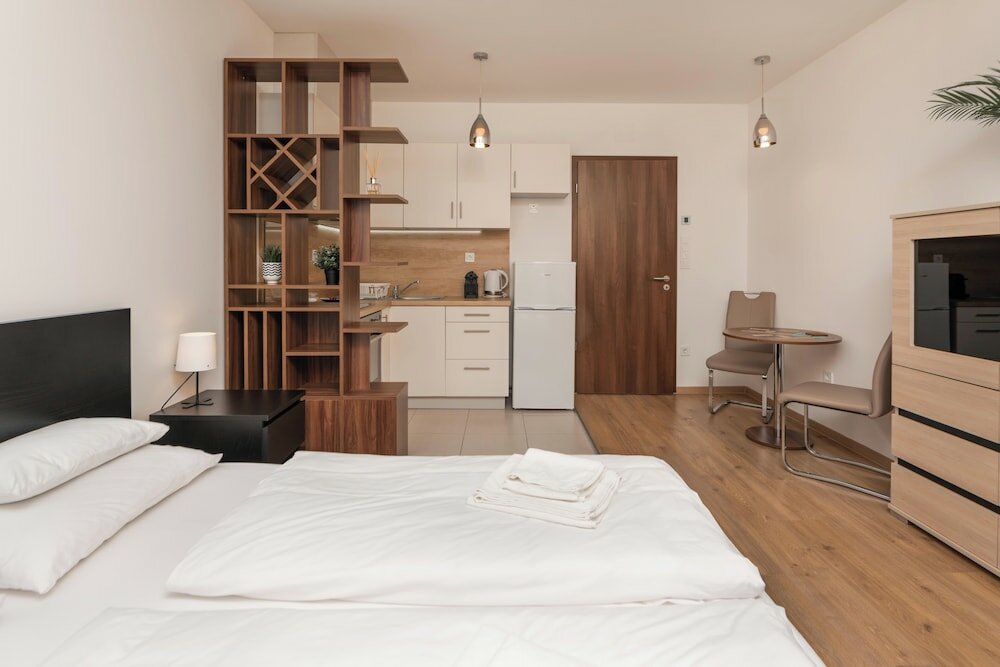 Фото WaterFront City Apartments by UrbanRent