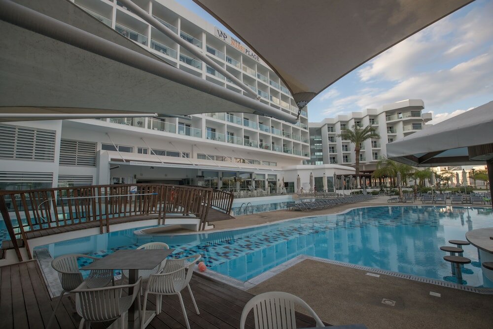 Фото Vassos Nissi Plage Hotel & SPA