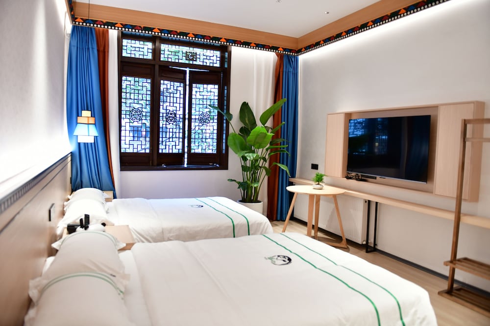 Фото Xishu Garden Inn