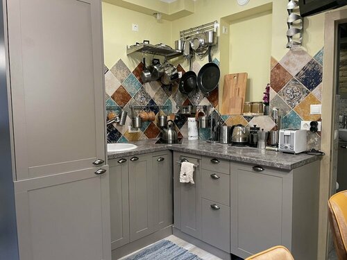 Апартаменты Изысканные апартаменты с 1 спальней и садом в центре города в Риге