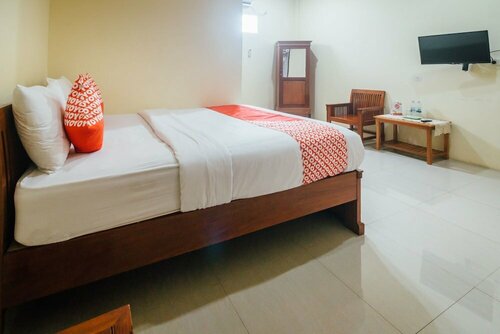 Гостиница Oyo 1300 Crecia Guest House в Амбоне