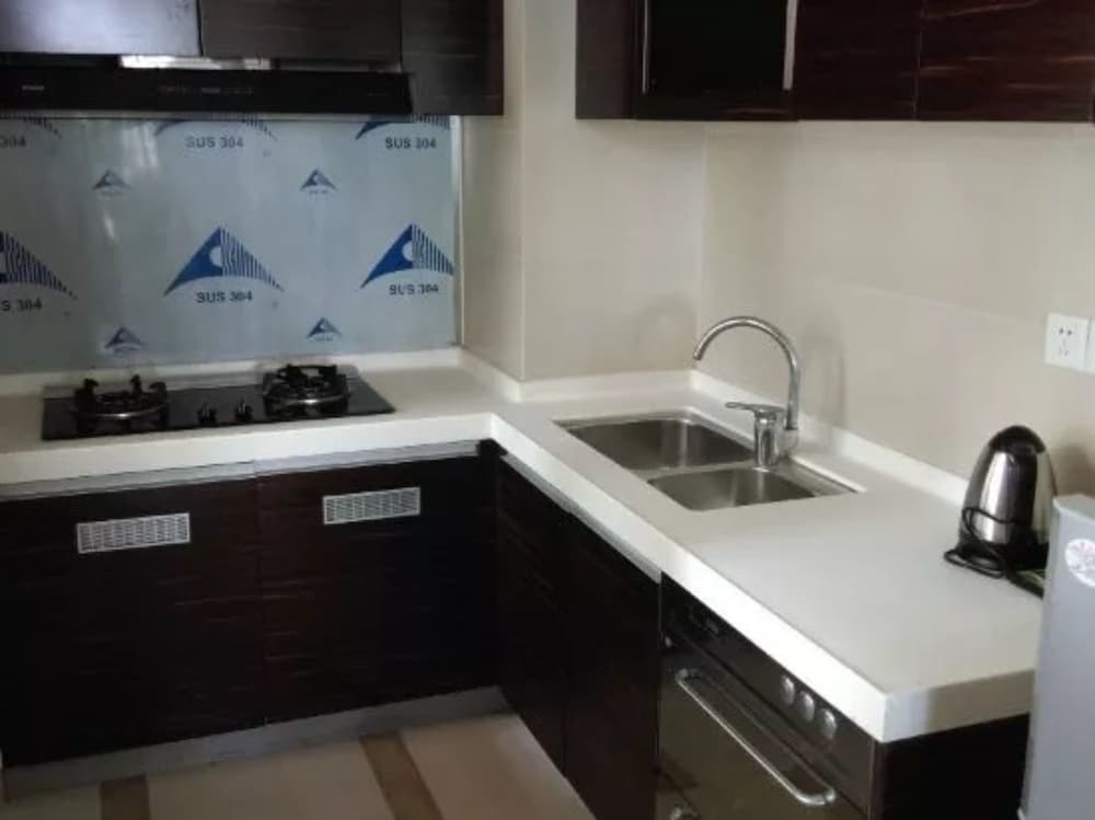 Фото Yumi Apartment-Quan Tian Xia Branch