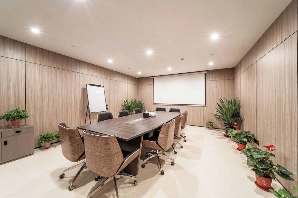 Фото Suzhou Yi Tang Service Apartment