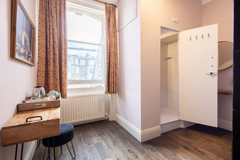 Фото Palmers Lodge Swiss Cottage