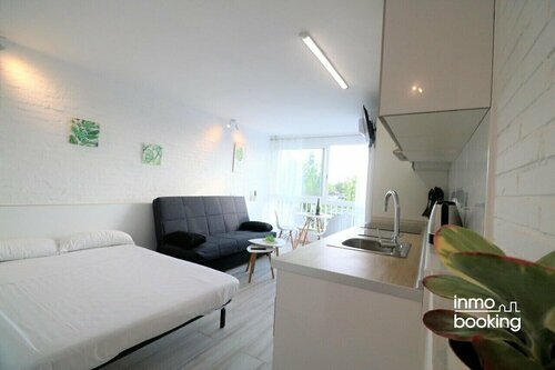 Гостиница InmoBooking Loft Ancora, climatizado y cerca de la palya