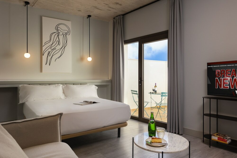 Фото Coeo ApartHotel Parras