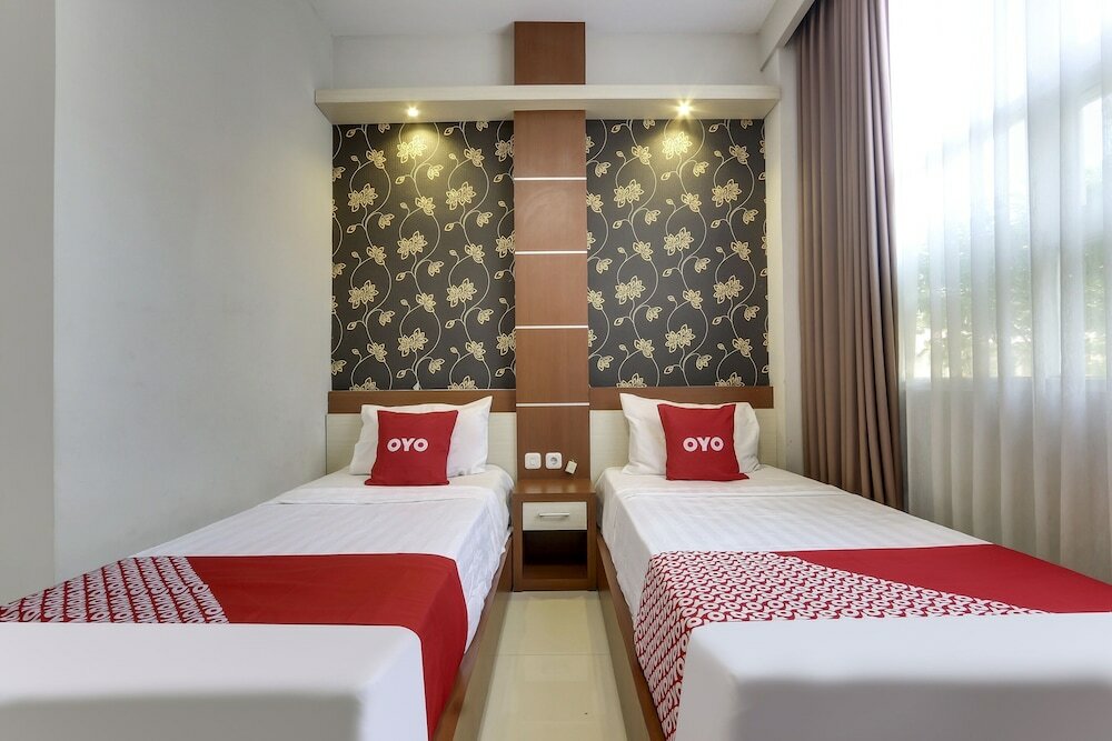Фото Oyo Flagship 90973 Hotel Karunia Pkpri