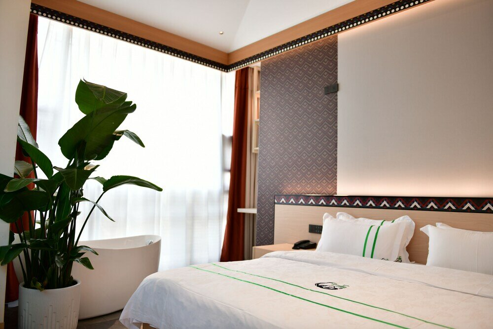 Фото Xishu Garden Inn