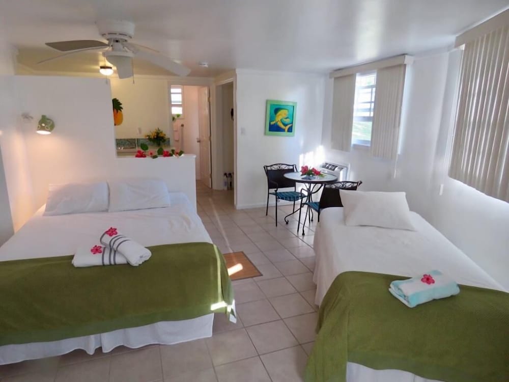 Фото Отель The Sunset Cove And Rainbow Room