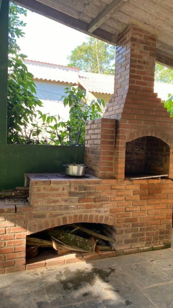 Фото Sítio Grande Mãe com cachoeira e piscina