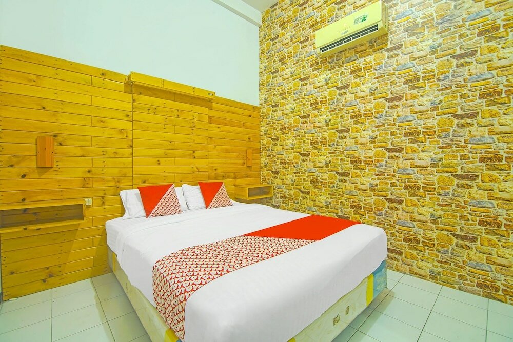 Фото Oyo 91730 De' Mande Homestay Syariah