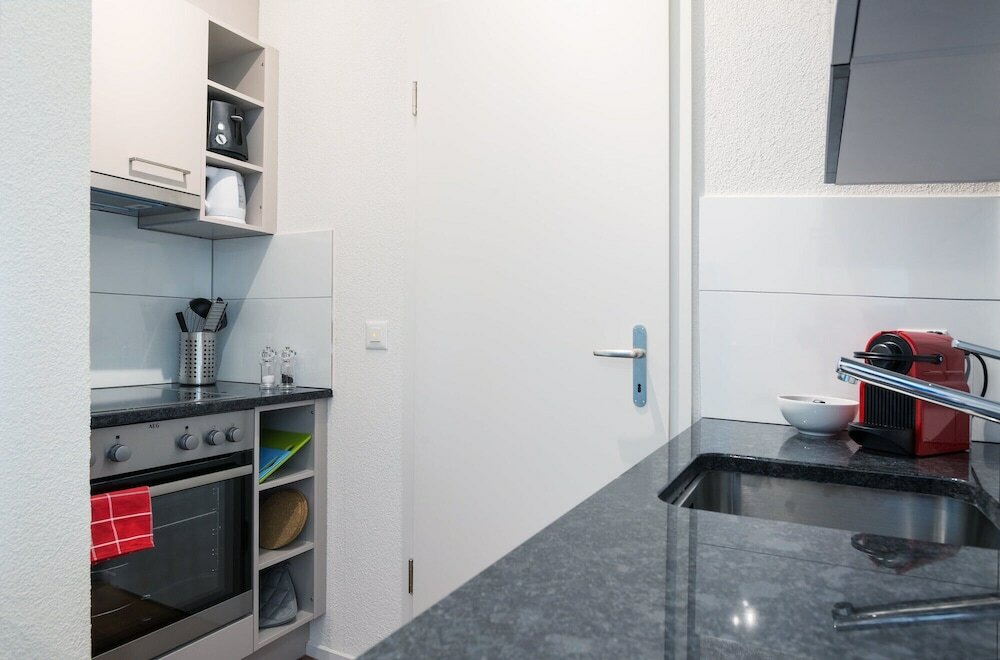 Фото Hitrental Altstetten Apartments