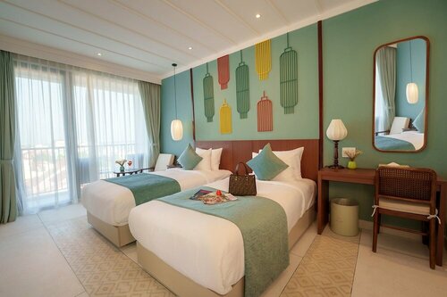 Гостиница Cozy An Boutique Hotel Hoian в Хойане