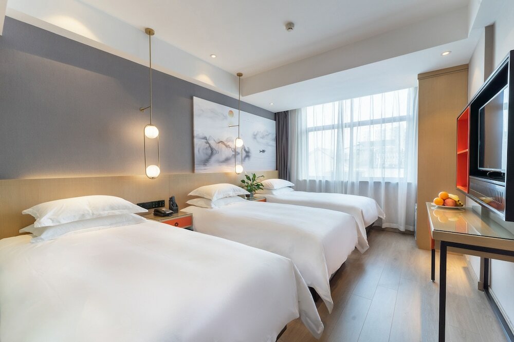 Фото Yì Wū Shì Bó Yì Měi Jū Hotel