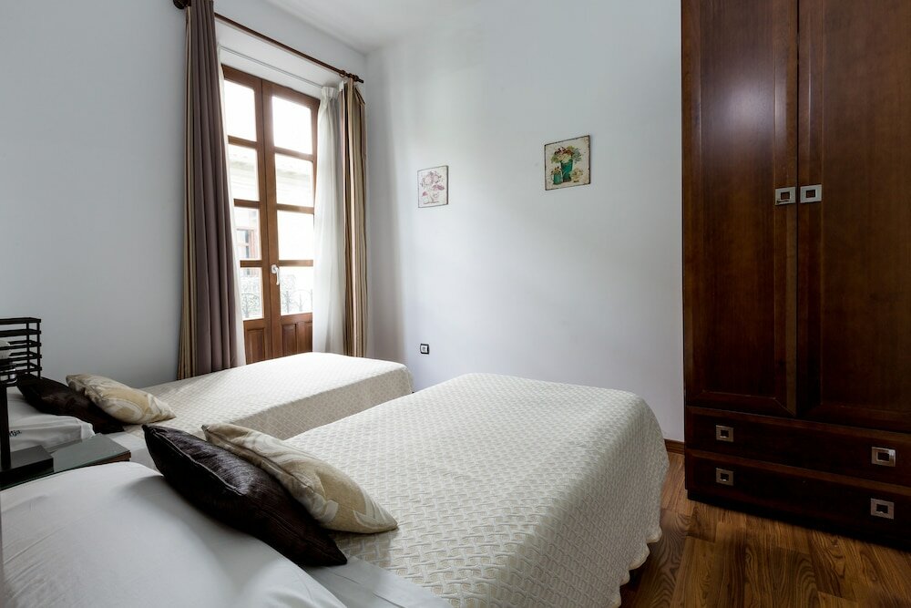 Фото Apartamentos Casa de la Lonja