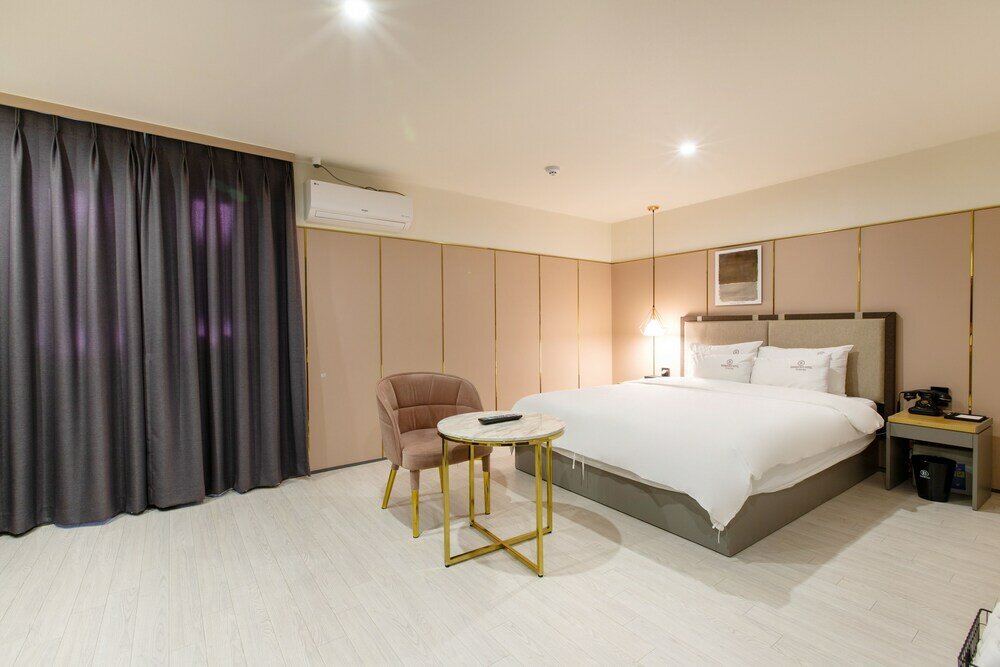 Фото Brown Dot Hotel Minam