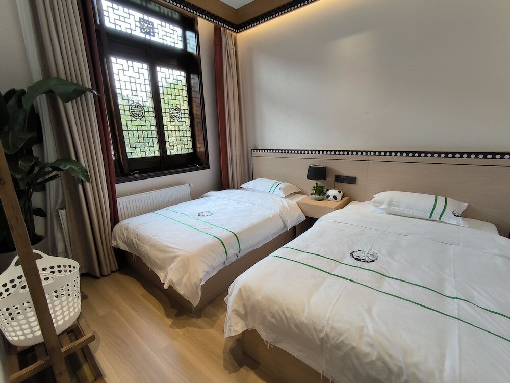 Фото Xishu Garden Inn