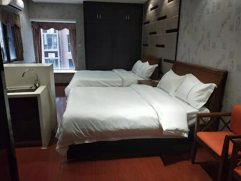 Фото Sixiangjia Apartment