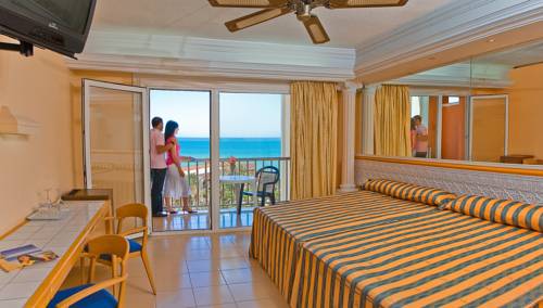 Фото Playacapricho Hotel