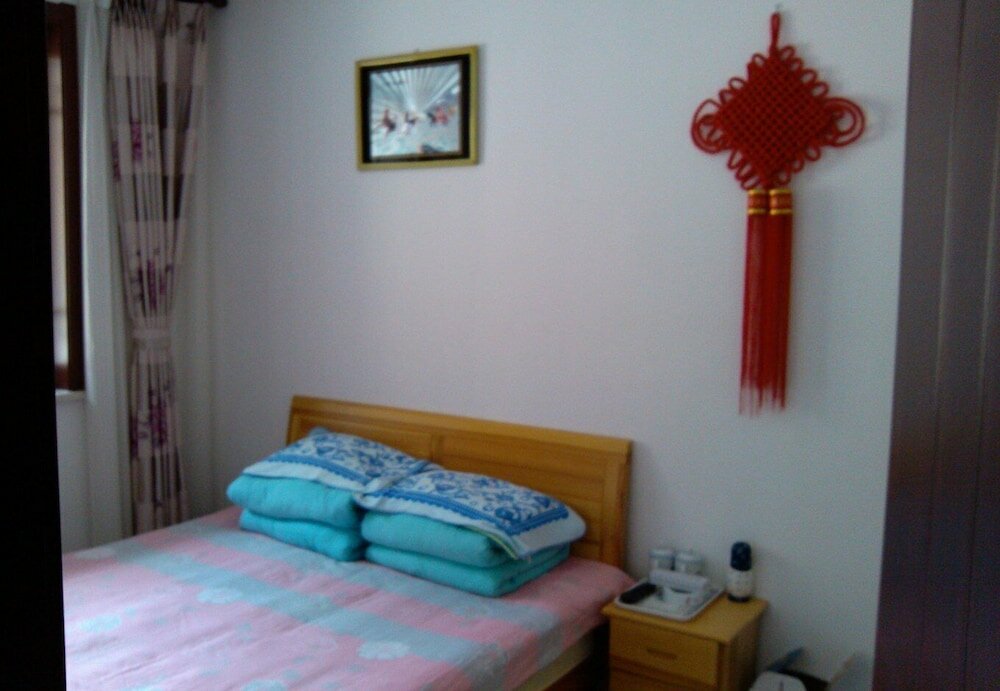 Фото Xinyue Folk Farmhouse Inn