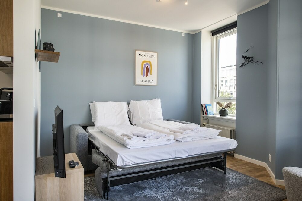 Фото By the Lakes apartments - Into This Place