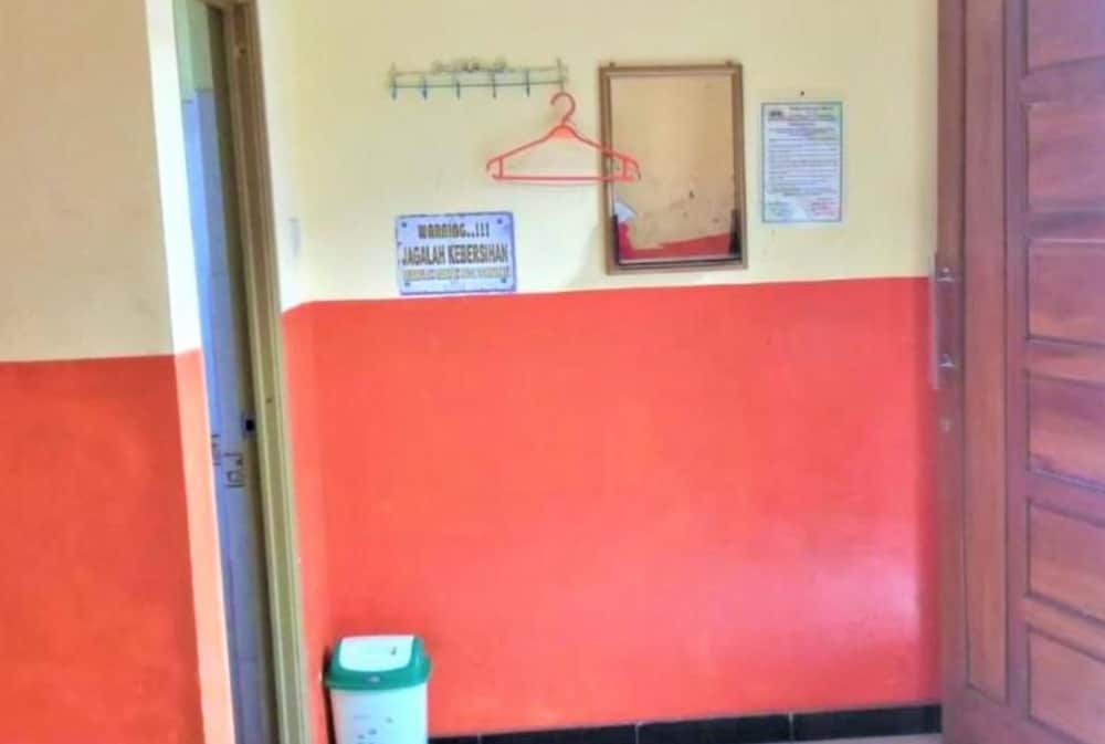 Фото Penginapan Rezeki