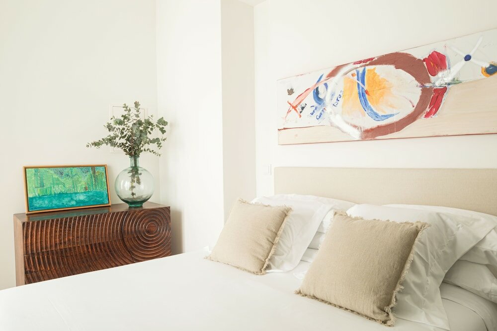 Фото Mylu Suites by Puerta Catedral