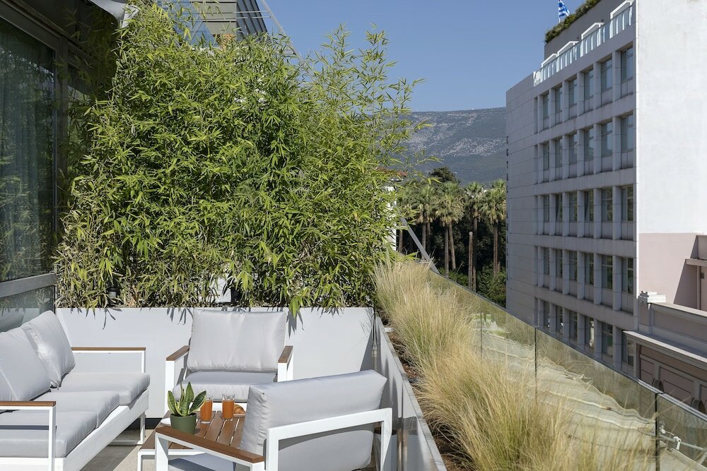 Фото The Athenians Art Apartments