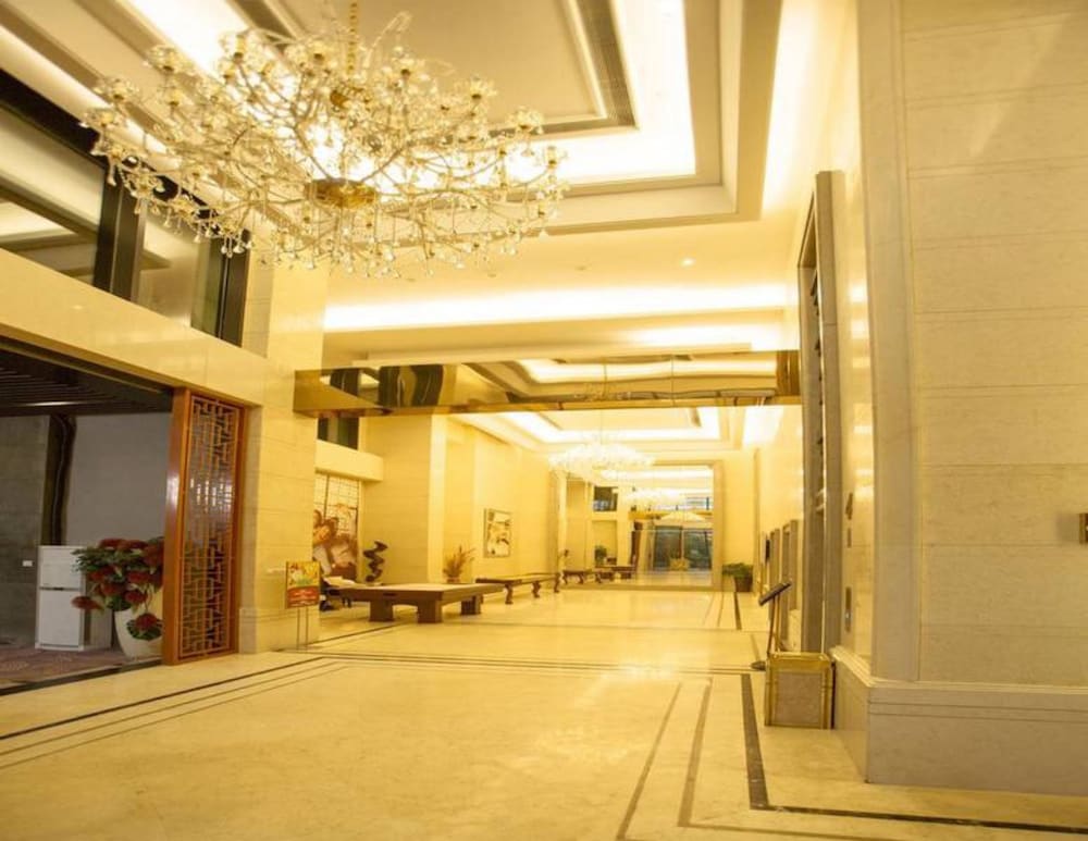 Фото BaiHe International Apartment Hotel