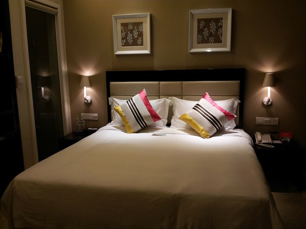 Фото KaiMan Hotel