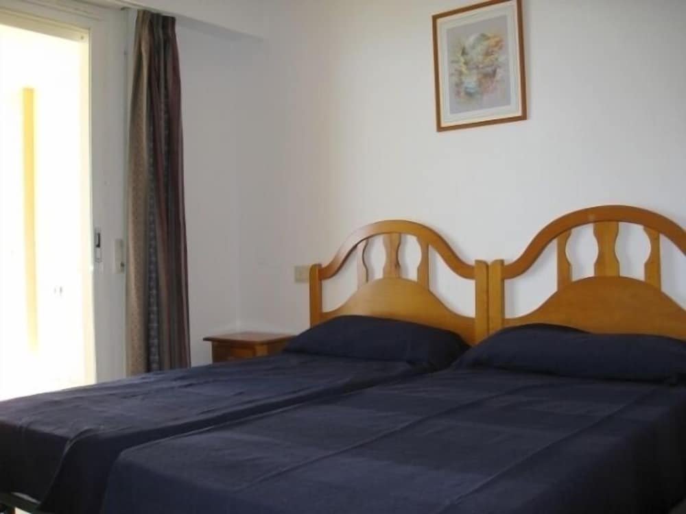 Фото Apartamentos la Reina