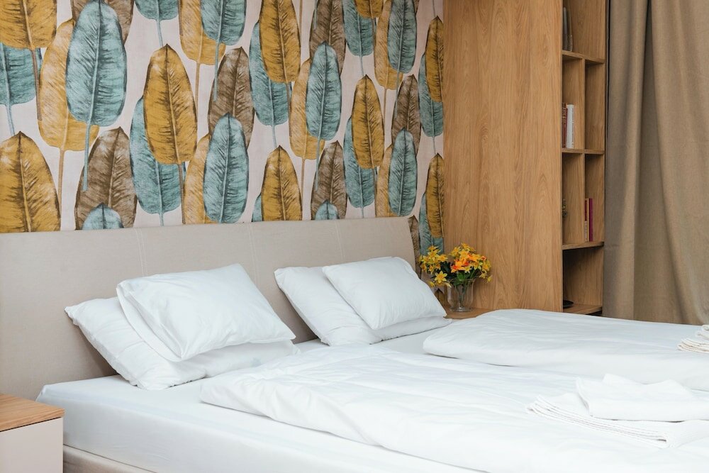 Фото WaterFront City Apartments by UrbanRent