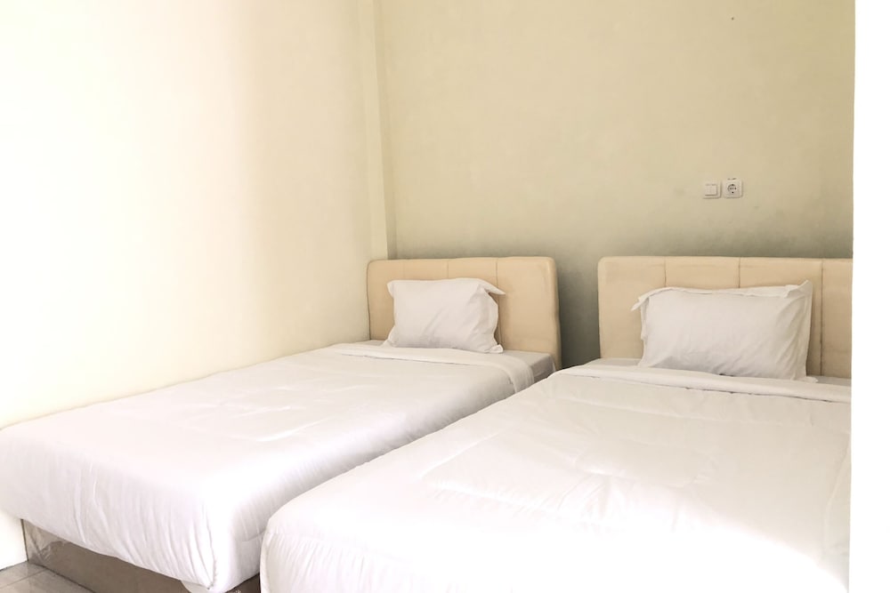 Фото Oyo 90299 Corner Guest House