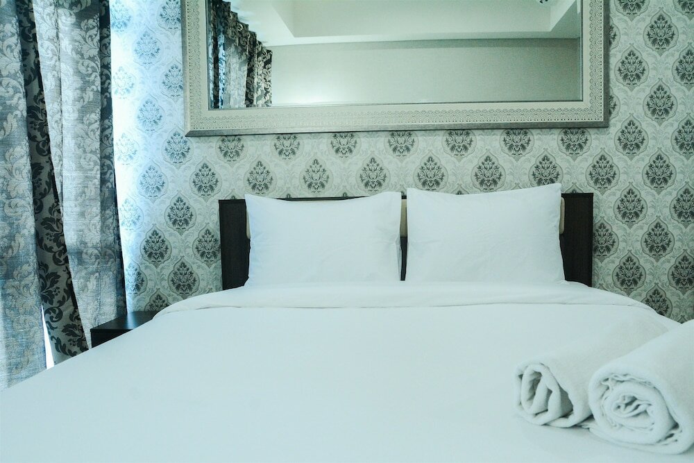 Фото Modern City View Studio Apartment at Puri Mansion