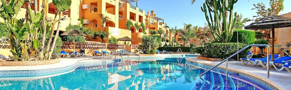 Фото Oasis de Riviera Apartment