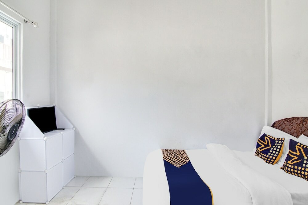 Фото Spot On 91858 Raja Homestay Syariah