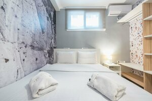 Апартаменты Welcoming Koukaki Home by Cloudkeys