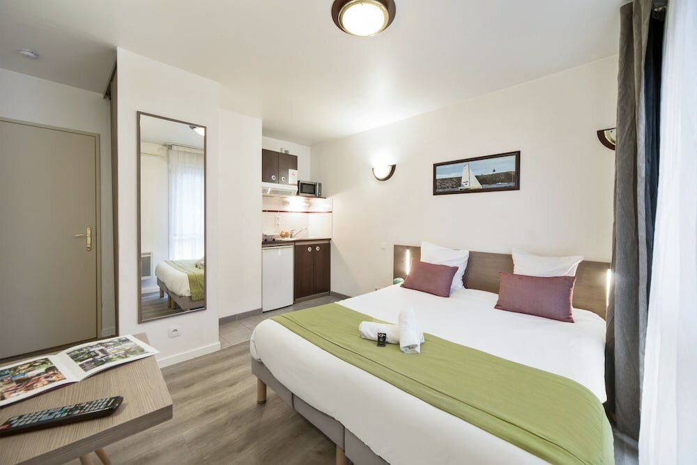 Фото Comfort Aparthotel Versailles Saint Cyr Lecole 