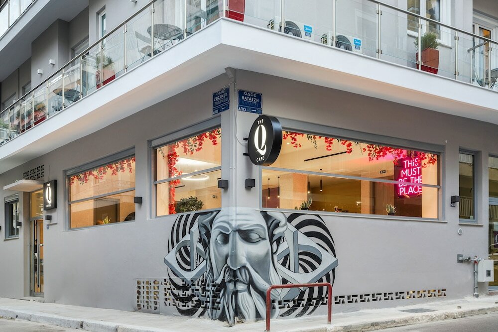 Фото The Q Hotel