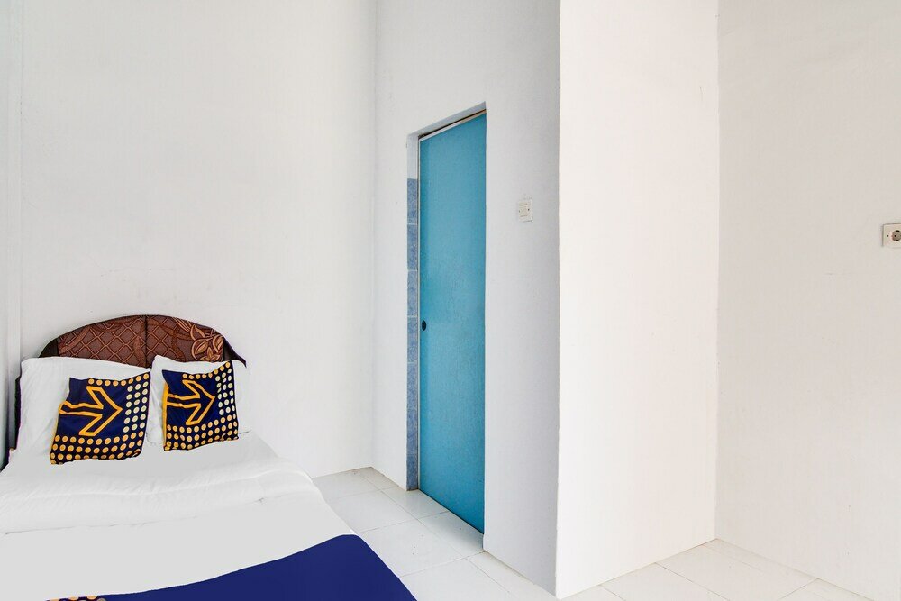 Фото Spot On 91858 Raja Homestay Syariah