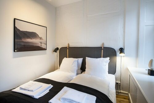 By Town Hall apartments - Into This Place
