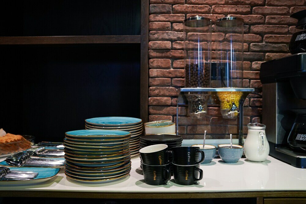 Фото Epigraph Town Hotel