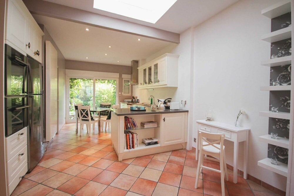 Фото Cozy Hackney Apartment