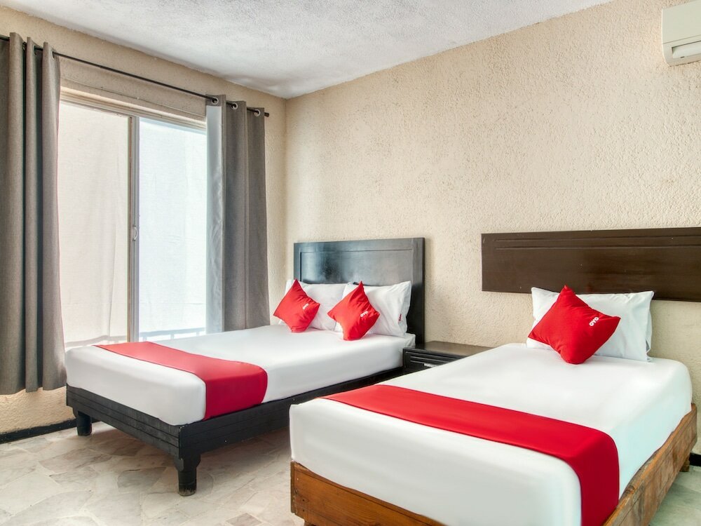 Фото Capital O Hotel La Siesta, Gómez Palacio