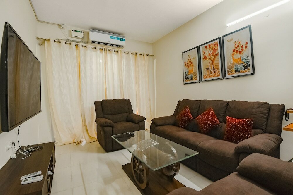 Фото Fabhotel Prime Santoshi Holiday Homes