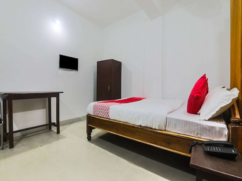 Фото Oyo Flagship 15828 Neexotica