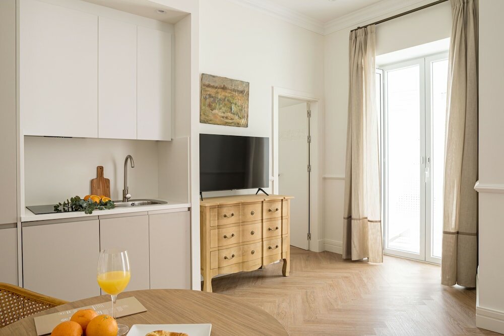 Фото Mylu Suites by Puerta Catedral