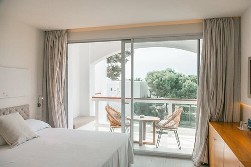 Гостиница Destino Pacha Ibiza - Adults Only - Entrance to Pacha Club Included в Санта-Эулалия-дель-Рио
