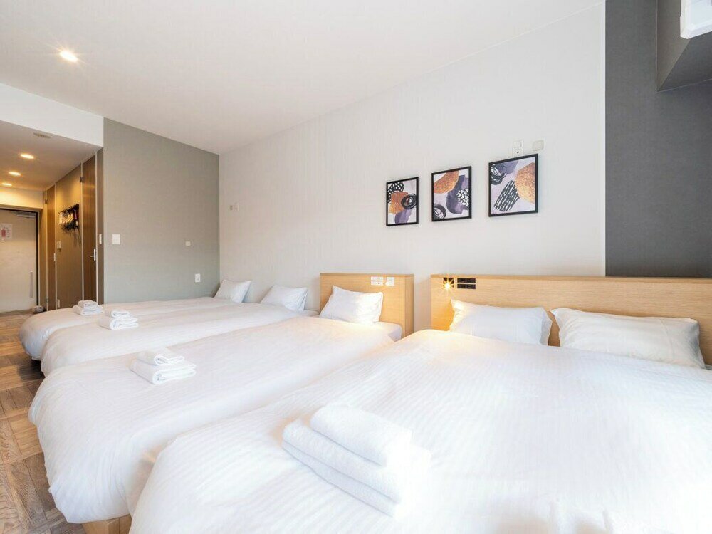 Фото Wellstay Osaka Shinimamiya