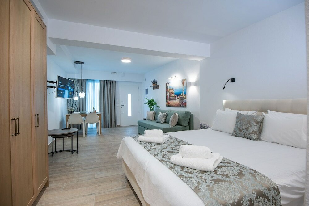 Фото Ammos Luxury Suites